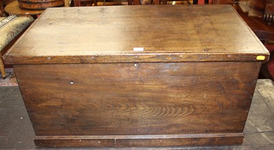 Lot 1323 - An elm hinge top blanket chest of plain...