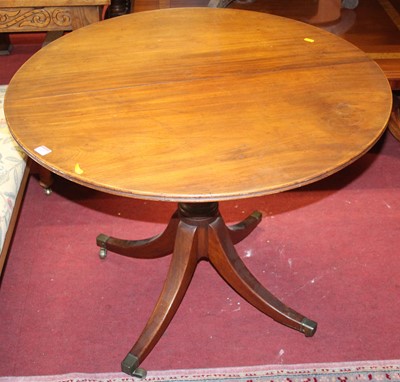 Lot 1327 - A 19th century mahogany circular tilt-top...