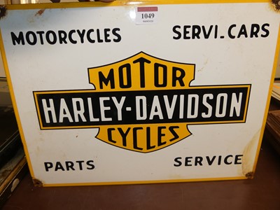 Lot 1049 - An enamel advertising sign for Harley Davidson...