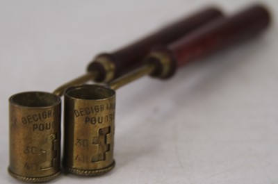 Lot 536 - A pair of  French powder measures, each having...