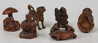 Lot 538 - A collection of six Japanese carved boxwood...