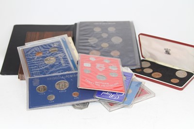 Lot 563 - A collection of coins and year sets to include...