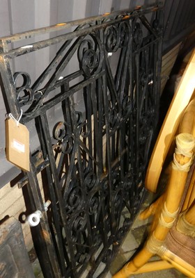 Lot 1405 - A pair of black painted wrought iron garden...