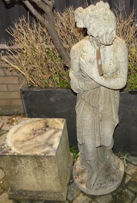 Lot 1408 - A reconstituted stone garden statue of the...