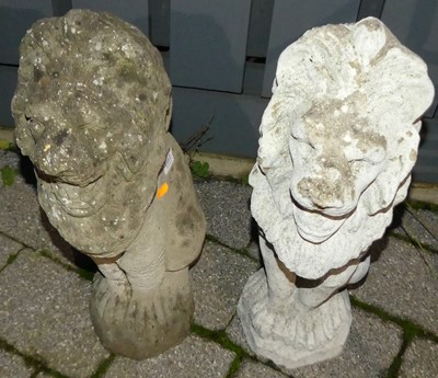 Lot 1412 - A pair of concrete garden seated lion figures,...