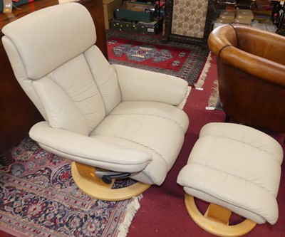 Lot 1329 - A contemporary cream leather upholstered...