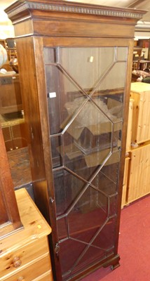 Lot 1402 - A 19th century mahogany narrow single door...