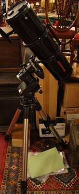 Lot 1418 - A Celestron telescope on tripod stand, with...