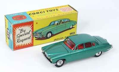 Lot 1101 - Corgi Toys No. 238 Jaguar MkX comprising of...