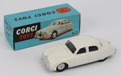 Lot 1024 - Corgi Toys, 208 Jaguar 2.4 litre, white body...