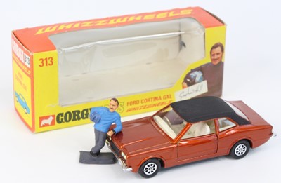 Lot 1065 - Corgi Toys No. 313, Ford Cortina in bronze...