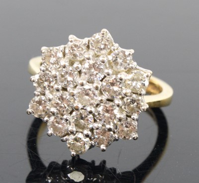 Lot 1306 - An 18ct yellow and white gold diamond circular...