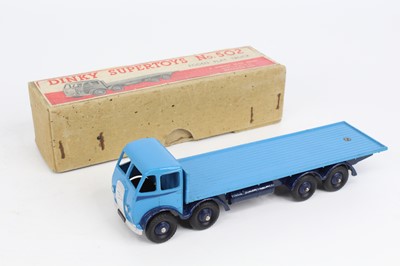 Lot 1126 - Dinky Toys No. 502 Foden flat truck comprising...