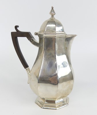 Lot 1176 - A late Victorian silver hot water pot, of...