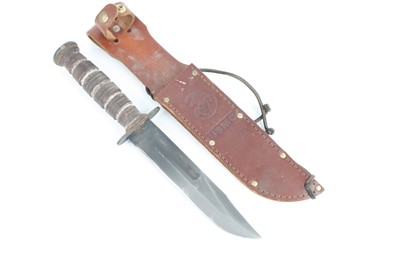 Lot 454 - A Ka-Bar USMC fighting knife, having a 17.5cm...