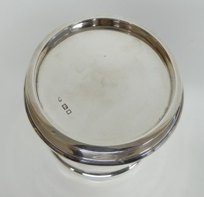 Lot 1201 - A George V silver jar and cover, of plain...