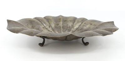 Lot 1212 - A continental hammered silver footed bowl, of...