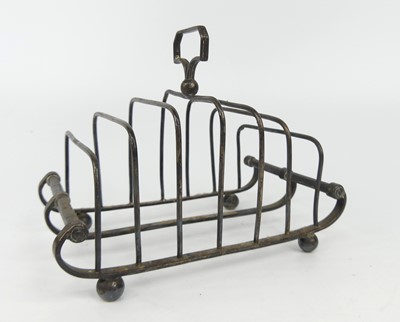 Lot 1152 - A George III silver six division toast rack,...