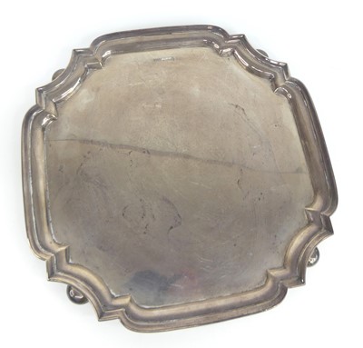 Lot 1206 - A George VI silver salver, of shaped square...
