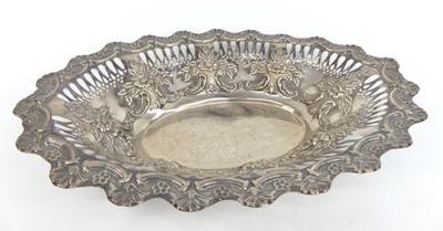 Lot 1174 - A Victorian silver bread basket, of shaped...