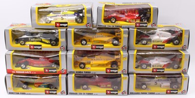 Lot 950 - 11 Burago 1/24th scale Formula 1 Racing Cars,...