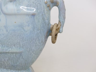 Lot 11 - A Chinese blue glazed centre piece, relief...