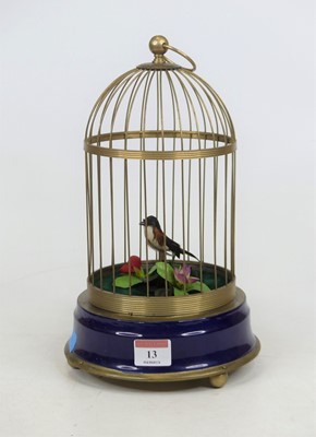 Lot 13 - A musical automaton in the form of a birdcage,...