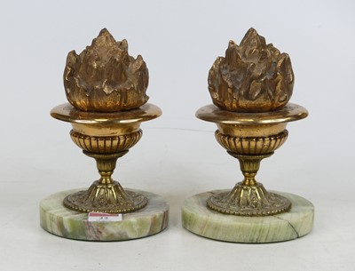 Lot 22 - A pair of polished brass garnitures, each in...