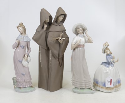 Lot 31 - A Lladro bisque porcelain figure group of two...