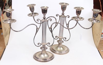 Lot 42 - A pair of Edwardian silver plated three branch...
