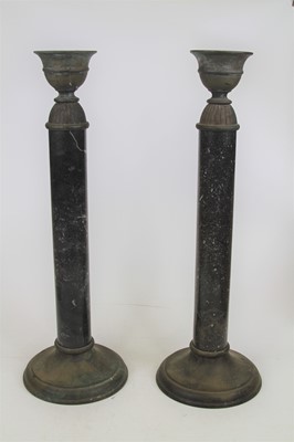 Lot 54 - A pair of verdigris metal mounted polished...