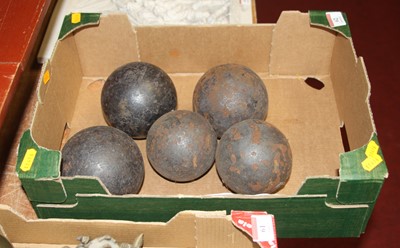 Lot 62 - Five antique iron cannon balls of various...