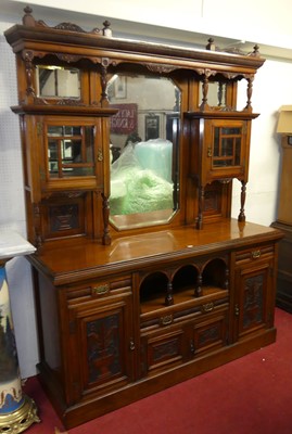 Lot 1154 - A large late Victorian walnut mirror back...