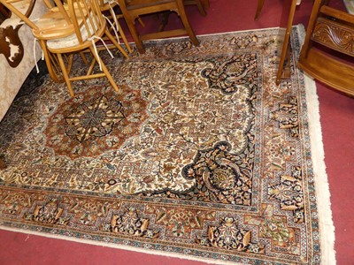 Lot 1182 - A Persian woollen Kashmir rug, with typical...