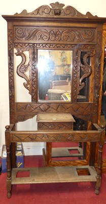 Lot 1188 - An early 20th century line carved oak...