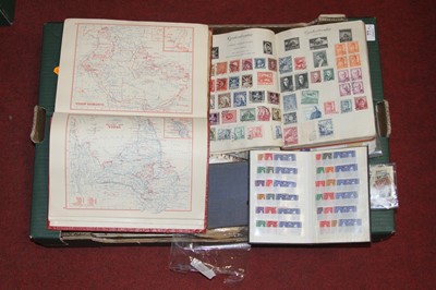 Lot 77 - A Royal Mail red canvas bound stamp album and...