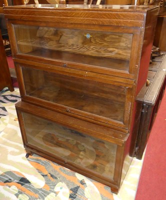 Lot 1250 - A 1930s Globe Wernicke oak three-tier stacking...