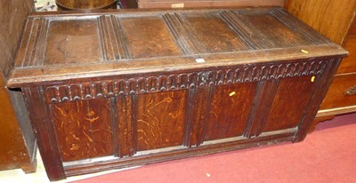 Lot 1252 - A 18th century joined oak four panelled hinge...