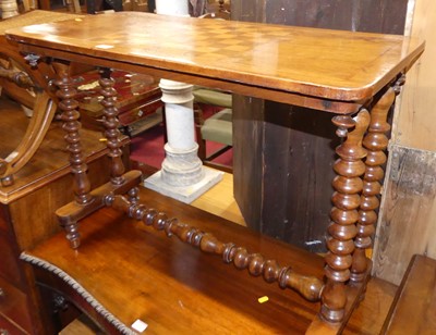 Lot 1256 - A Victorian walnut and chess board topped...