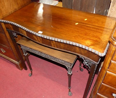 Lot 1257 - A 19th century mahogany serpentine front side...