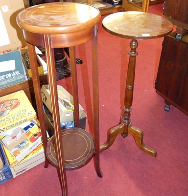 Lot 1281 - A stained beech circular plant stand, h.85.5cm;...