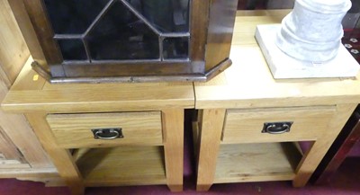 Lot 1292 - A pair of contemporary blond oak single drawer...