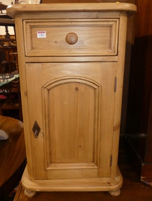 Lot 1301 - A modern pine round cornered single door...