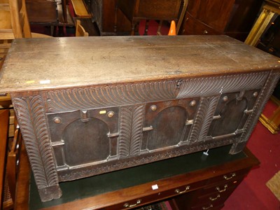 Lot 1335 - An 18th century joined oak three panel hinge...