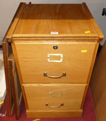 Lot 1079 - An oak two drawer filing cabinet, w.40.5cm