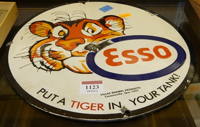 Lot 1123 - An enamel advertising sign for ESSO, dia.30cm