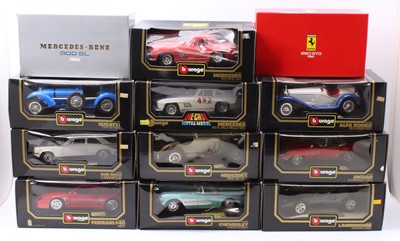 Lot 951 - 12 Burago 1/18th scale boxed diecasts, with...