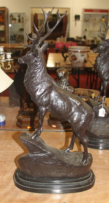 Lot 101 - A large pair of bronzed models of stags, each...