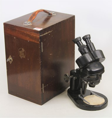 Lot 104 - A vintage Watson binocular microscope, cased,...