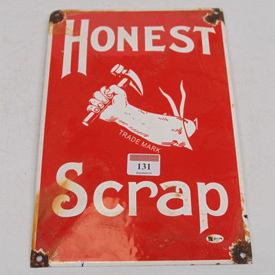 Lot 131 - A convex enamel on metal Honest Scrap...